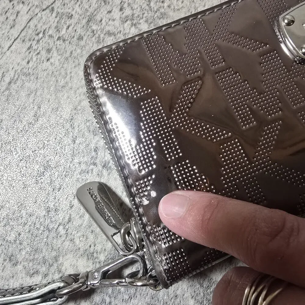 Michael Kors Metallic Zip Around Wallet Silver Mirror Metallic Good Condition